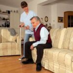 Home Care San Diego Caregiver Helping Senior Get Up