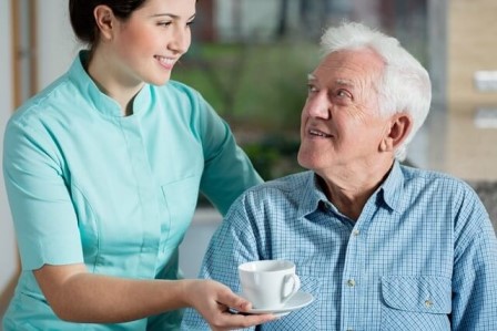 Home Care San Diego Caregiver Serving Senior Coffee